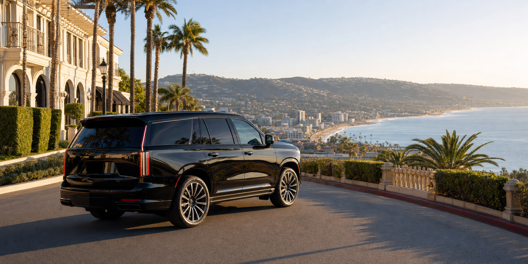 Luxury SUV on Pacific Coast Highway overlooking the LA coastline